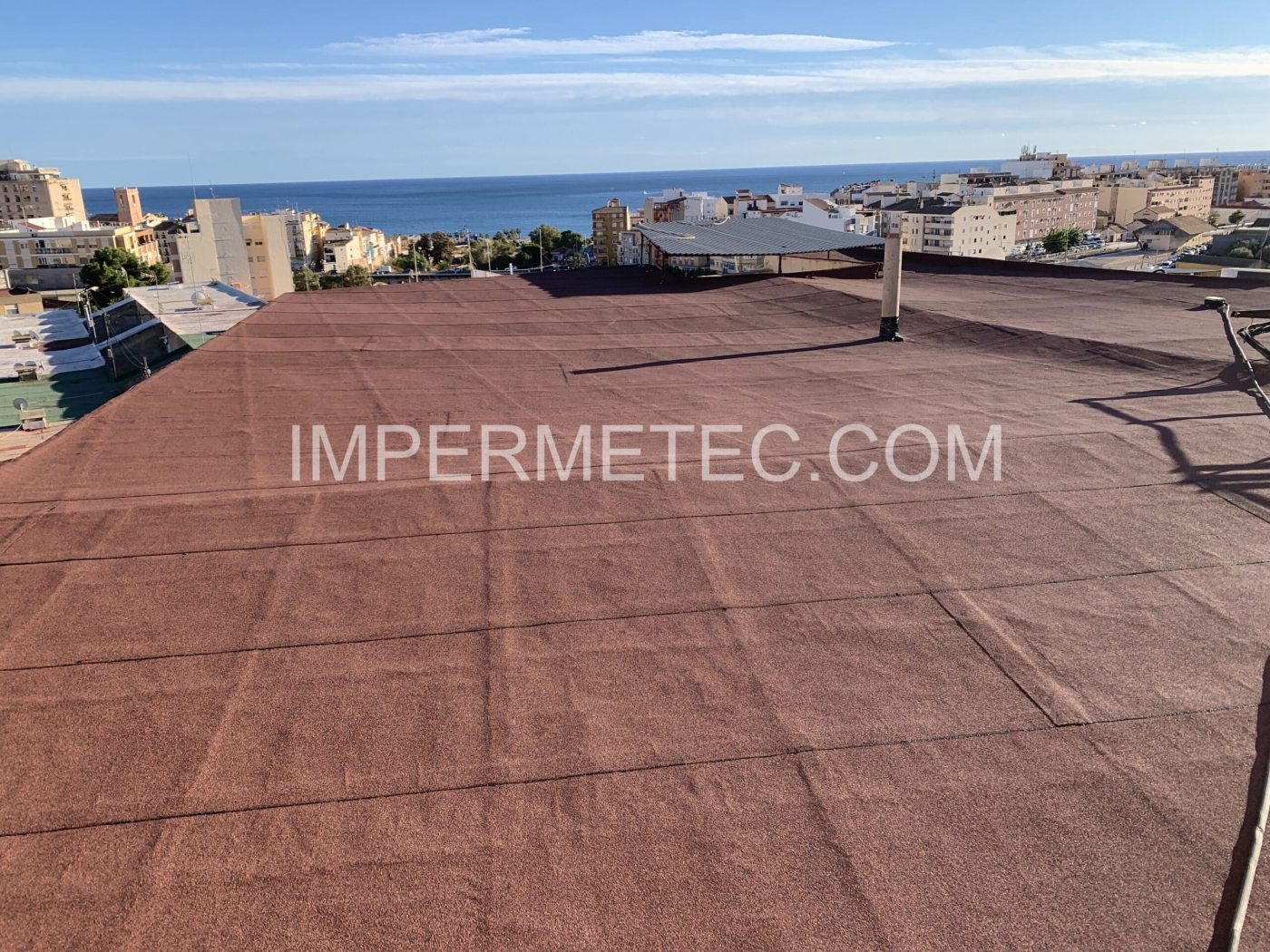 Azotea impermeabilizada en complejo residencial